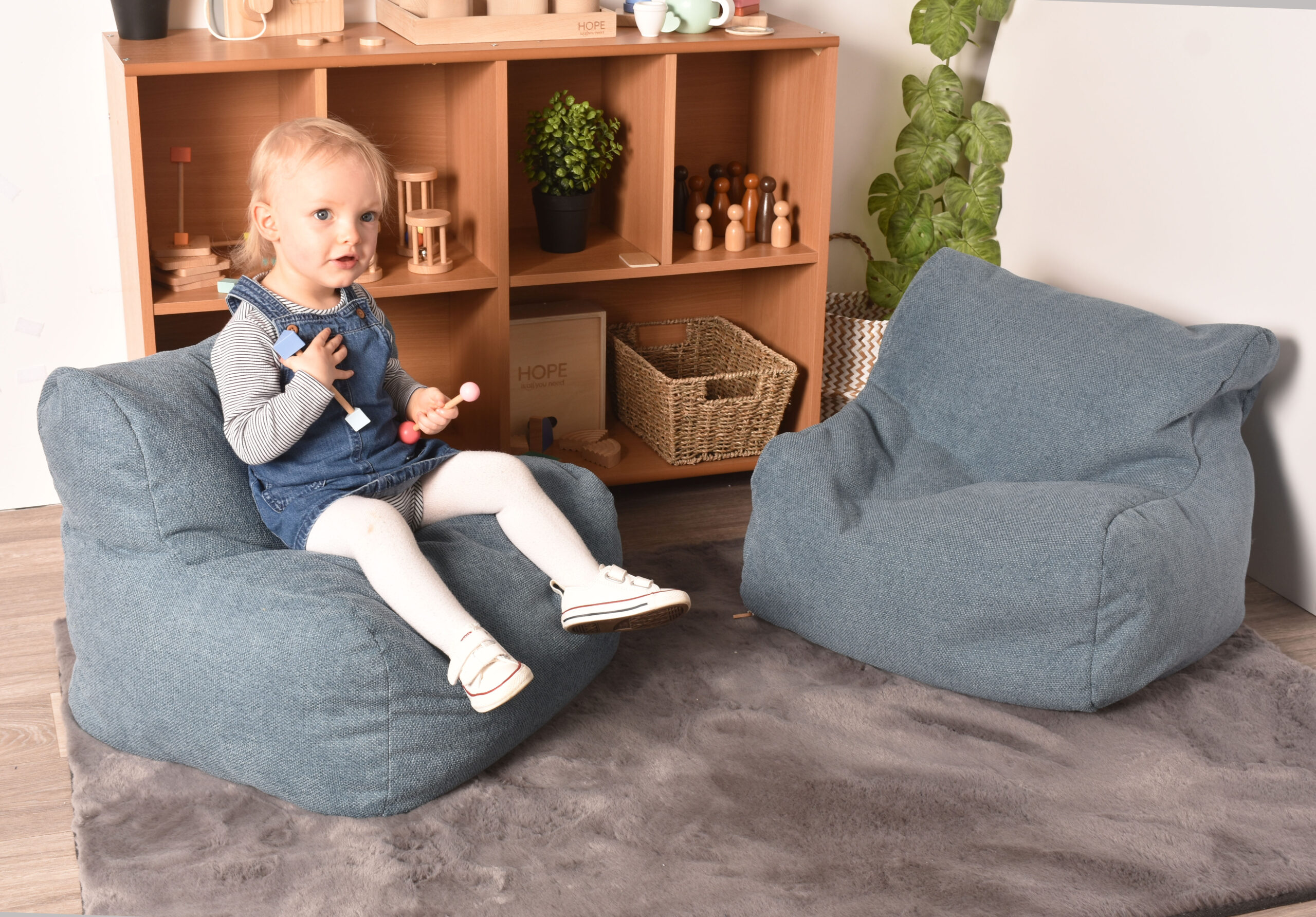1445664_Set_2_Blue_Chenille_Bean_Bag_Chairs_Model_shot_gfkcwf4Pg0.jpg